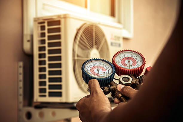Professional Heat Pump Repair technician working in Hampton, NJ